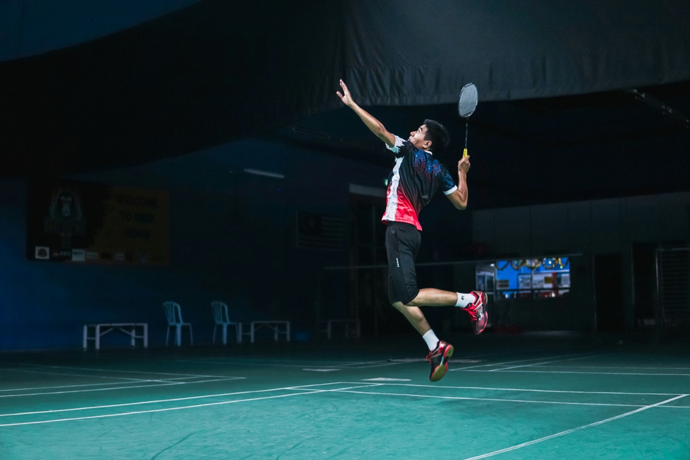 Badminton player on court